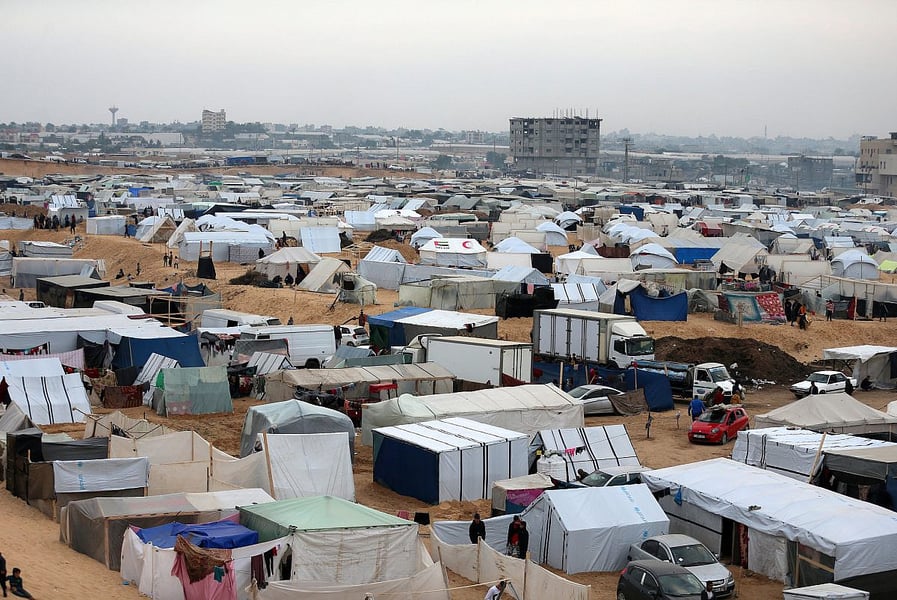 Mass Displacement Across Gaza Displaced Palestinian families sheltering in tents amid Gaza humanitarian crisis