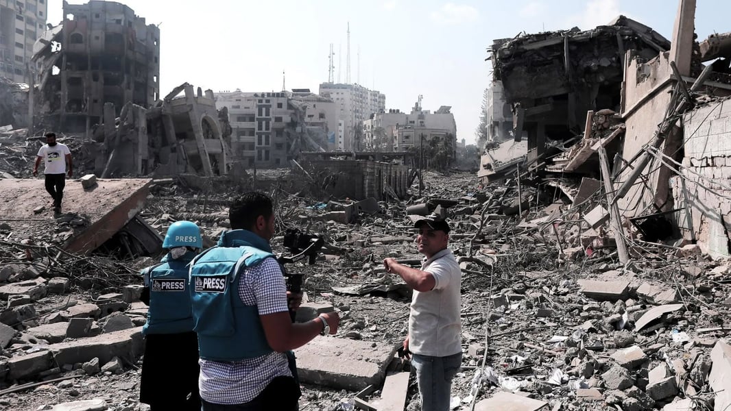 Destruction in Gaza as Israel bans Palestinian media outlets amid ongoing war