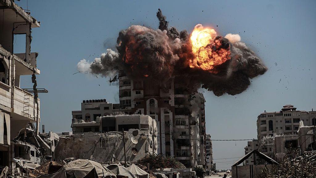 Airstrike aftermath in Gaza shows destroyed tents and civilian casualties