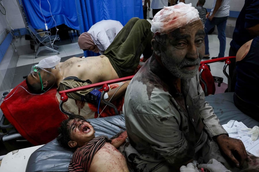 Gaza Healthcare System Collapse During War Doctors treating wounded civilians in overcrowded Gaza hospital during ongoing war