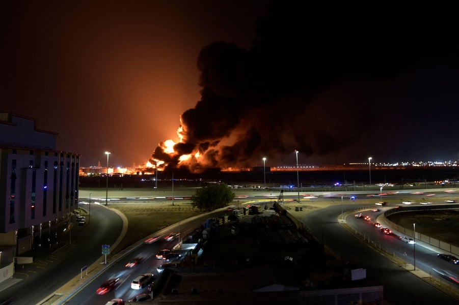 Gulf oil facilities burning after drone and missile strikes