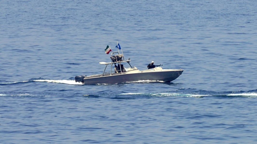 Iran Navy Patrols Hormuz During Israel–Iran War Iranian naval patrol boats near oil tankers in the Strait of Hormuz