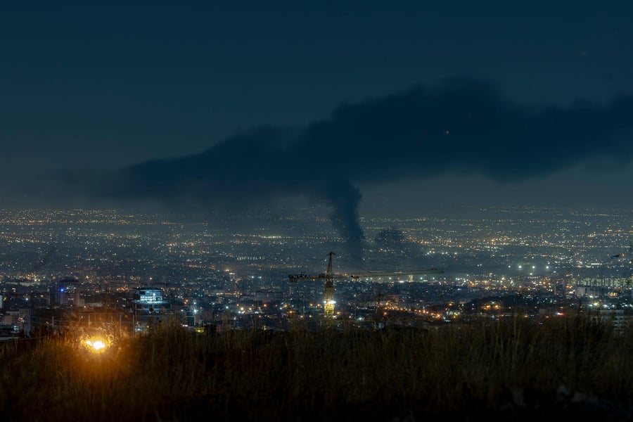 Toxic smoke rises over Tehran after Israeli airstrikes on oil facilities during Iran war