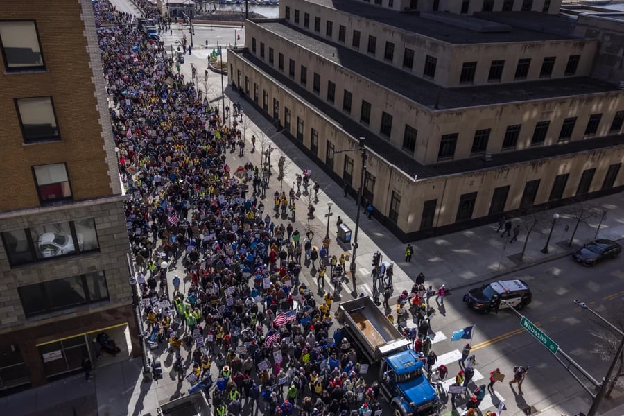 Thousands of No Kings protesters march across Memorial Bridge from Arlington, Virginia into Washington D.C. on March 28, 2026