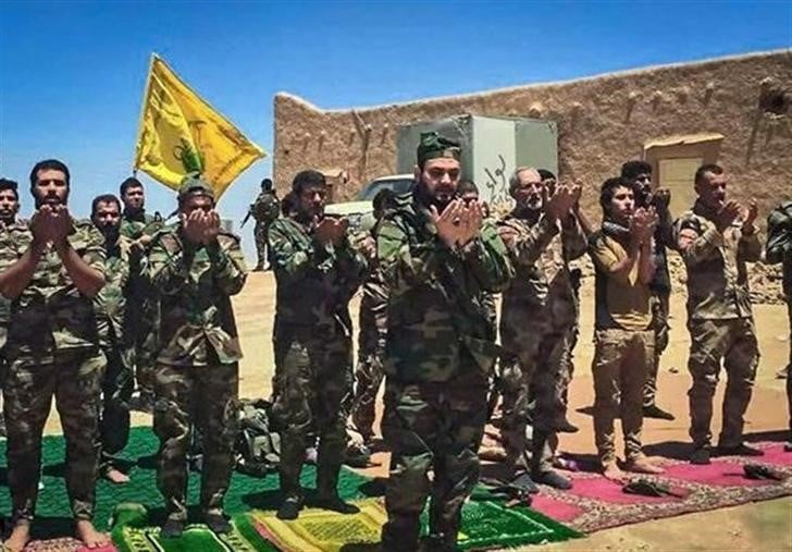 Harakat Hezbollah al-Nujaba fighters during a gathering in Iraq