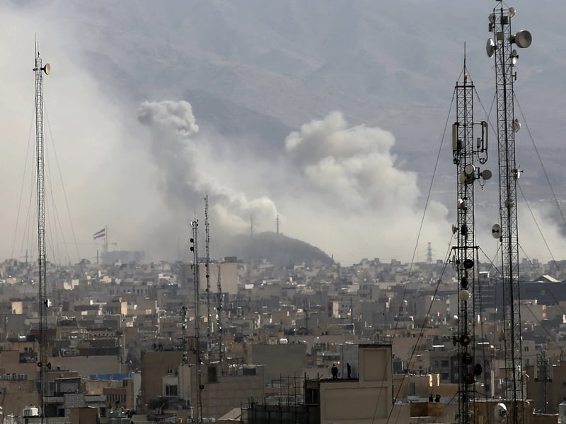 Smoke rises over Tehran after reported US-Israel airstrikes