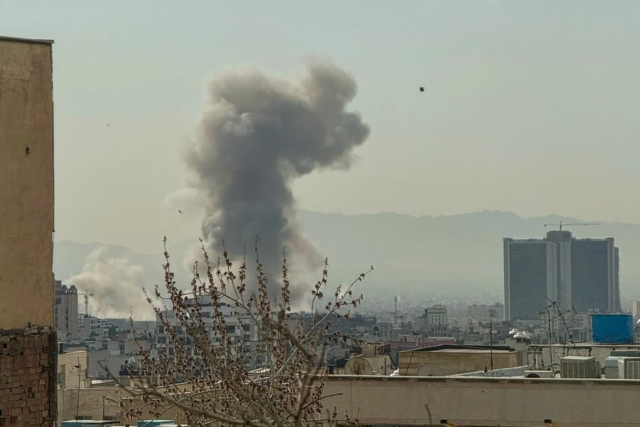 Smoke and destruction over Tehran after US-Israeli strikes on Iranian leadership in 2026