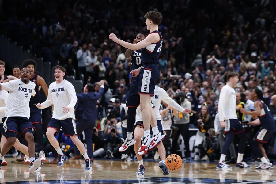 UConn Beats Duke 73-72 Elite Eight 2026 Final Score UConn 73, Duke 72 final score on the scoreboard at Capital One Arena during the 2026 NCAA Tournament Elite Eight