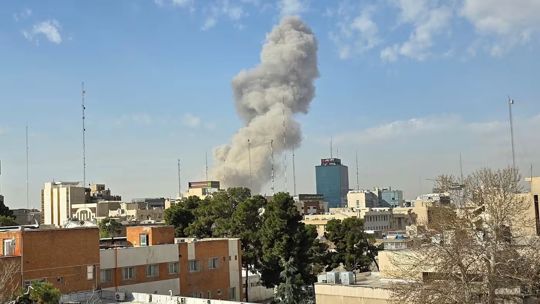 Smoke rises over Tehran after US and Israeli airstrikes targeting key military compounds