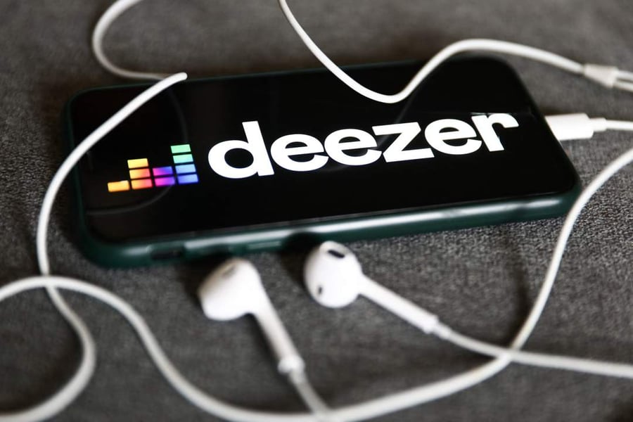 AI-generated music flooding Deezer platform with digital waveform visuals