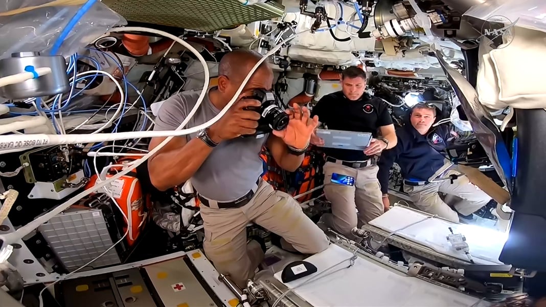 Artemis II Crew Inside Orion Spacecraft Artemis II astronauts inside Orion spacecraft during deep space mission