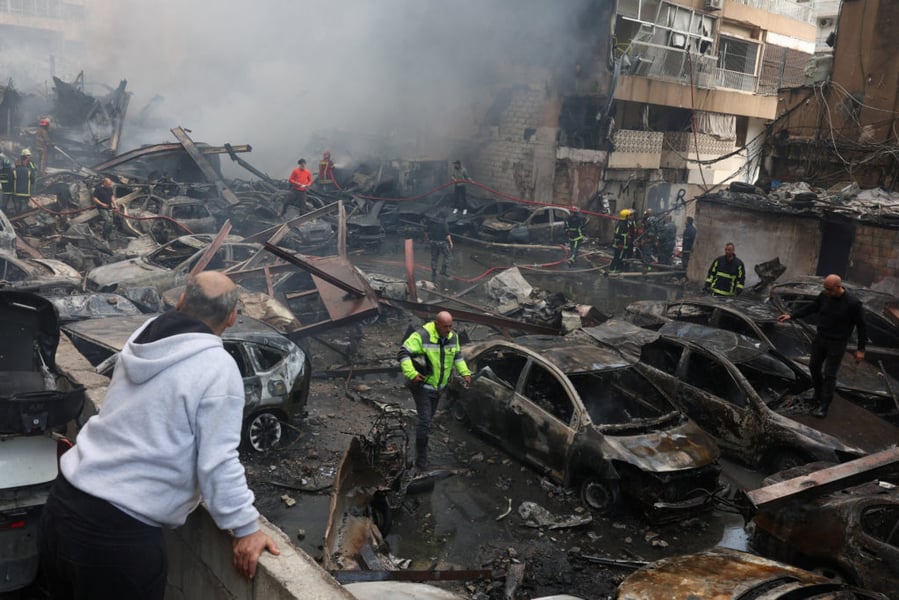 Smoke rises over Beirut during Israeli airstrikes amid ceasefire confusion