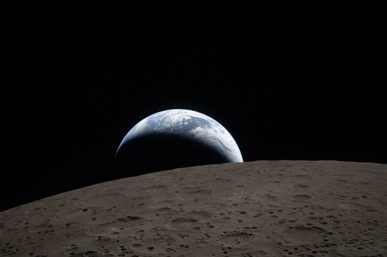 Earthrise captured during Artemis II mission Earth rising over the Moon as seen from Artemis II spacecraft