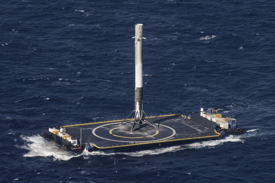 Falcon 9 booster landing on autonomous drone ship after GPS satellite launch