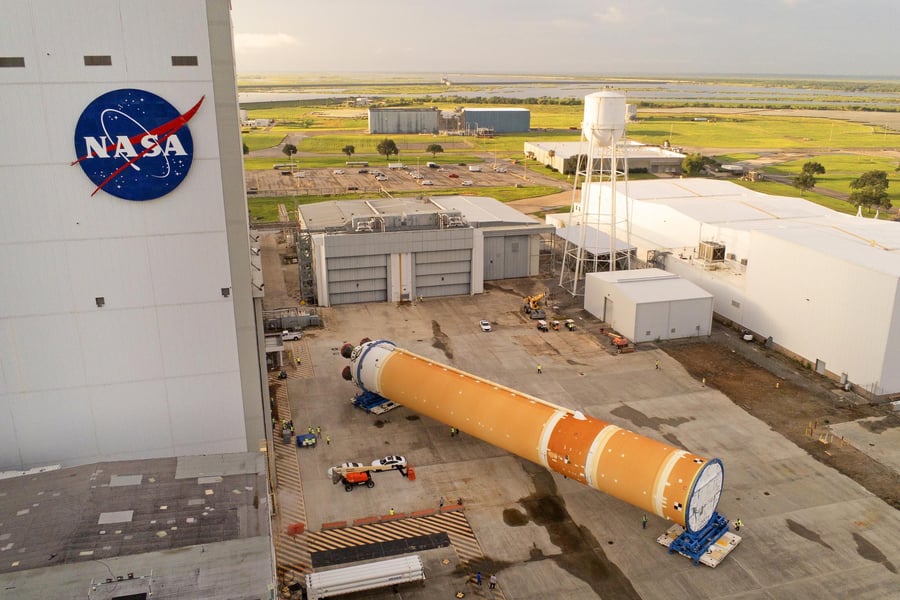 Artemis III Core Stage Assembly at Michoud Facility NASA engineers working on Artemis III SLS core stage inside Michoud Assembly Facility