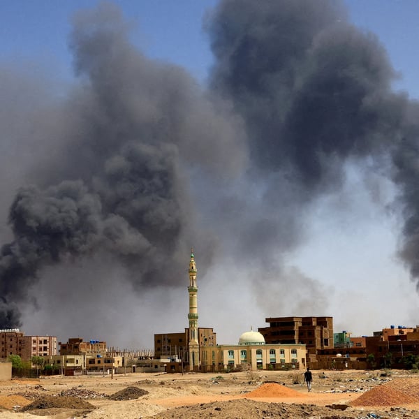 Thick black smoke billowing over residential buildings in El-Obeid, Sudan,