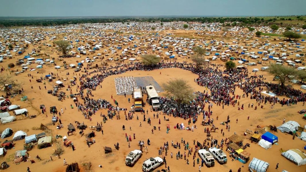 Displaced Sudanese civilians gather at a camp as famine spreads during the Sudan civil war in 2026