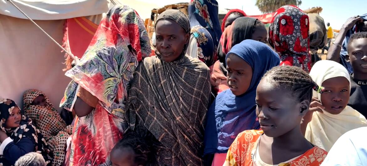 Displaced Sudanese women and children in a refugee camp during the Sudan Civil War