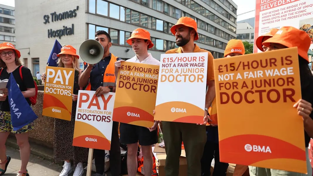 UK resident doctors strike outside NHS hospital over pay and training post cuts