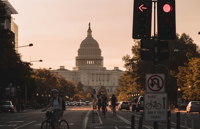 Washington Policy Battle Over Climate Spending US Capitol building at dusk representing political debate over climate funding and governance