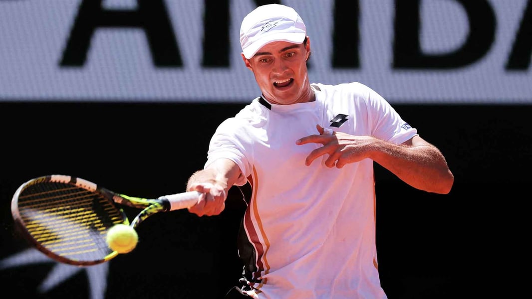 Adam Walton celebrates after defeating Daniil Medvedev in the French Open 2026 first round at Roland Garros