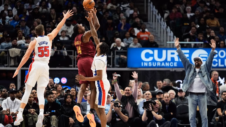 Cavaliers overtime scoring surge in Game 5 Donovan Mitchell drives to the basket during overtime in Cavaliers vs Pistons Game 5