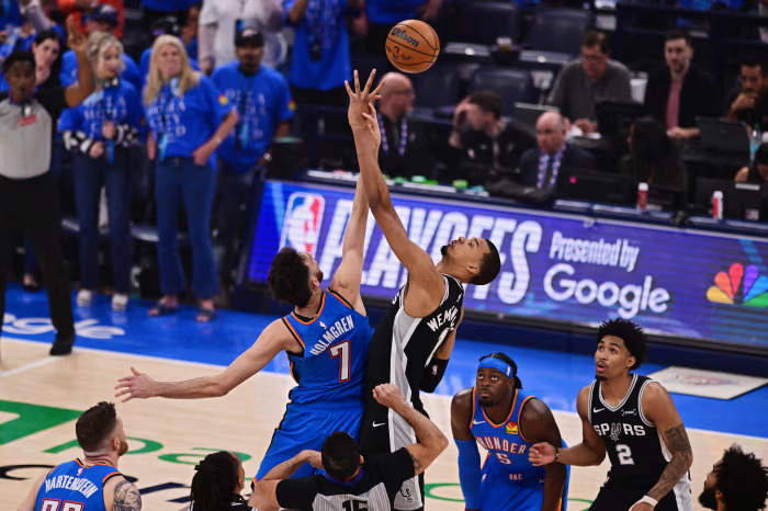 Wembanyama battles Thunder defense in Game 5 Victor Wembanyama shoots over Chet Holmgren during Western Conference Finals Game 5