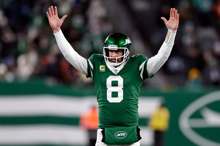 Aaron Rodgers during his MVP years with the Green Bay Packers celebrating a touchdown