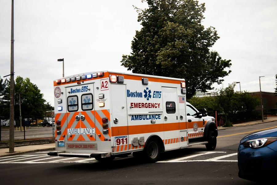 An ambulance parked outside a hospital emergency room entrance during a diversion order