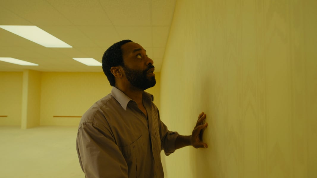 A scene from A24's Backrooms, directed by Kane Parsons, starring Chiwetel Ejiofor