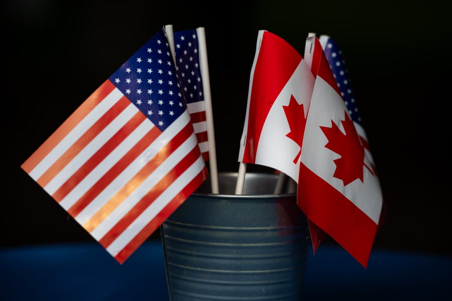 Canadian and American flags at the Rainbow Bridge U.S.-Canada border crossing in Niagara Falls
