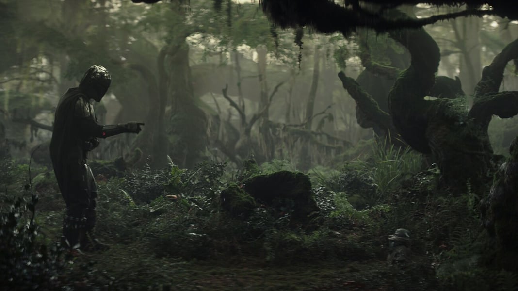 Din Djarin played by Pedro Pascal holds Grogu in a still from Lucasfilm's Star Wars: The Mandalorian and Grogu, the franchise's first theatrical release in seven years
