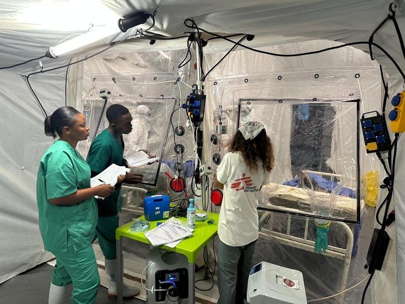 Frontline Medical Teams Race to Contain Ebola Doctors treating Ebola patients inside Congo treatment center