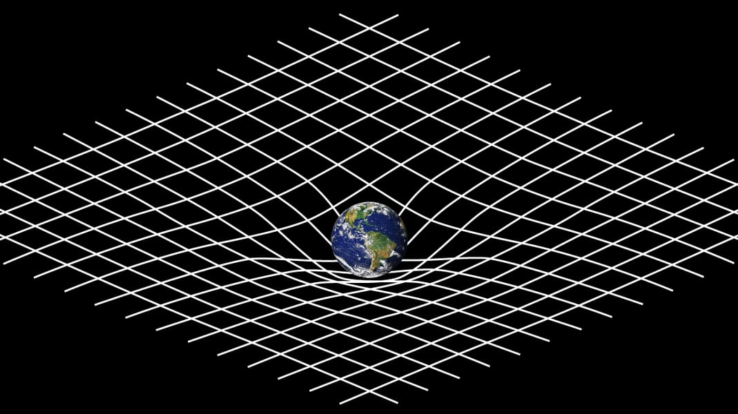 Illustration of spacetime curvature created by a massive object, central to Einstein's general theory of relativity