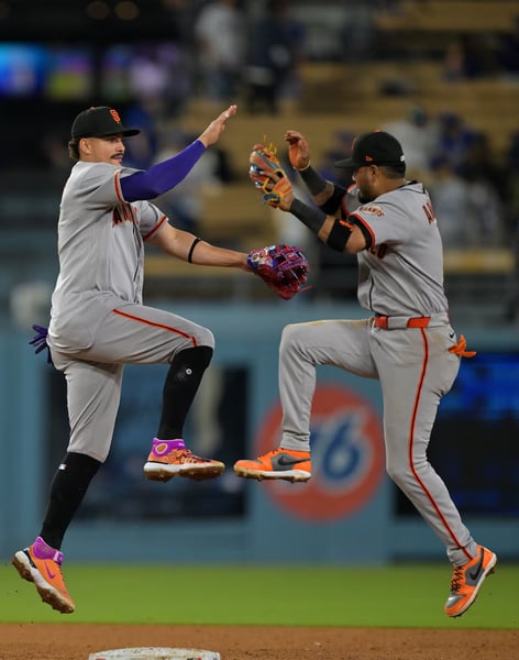 Eric Haase of San Francisco Giants celebrates home run against Los Angeles Dodgers