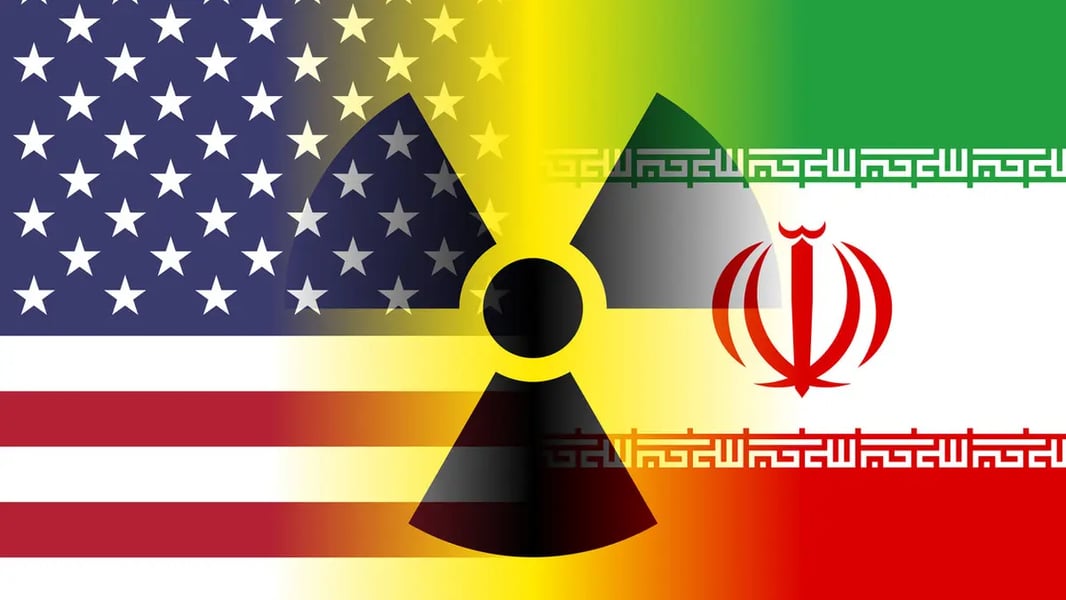 Iranian flags near a nuclear facility amid tensions over uranium enrichment talks with the US