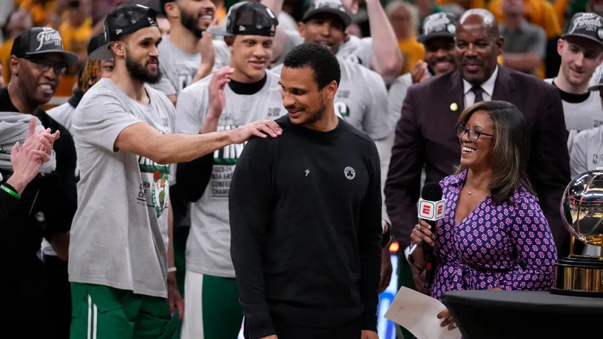 Joe Mazzulla instructs Boston Celtics players during a timeout