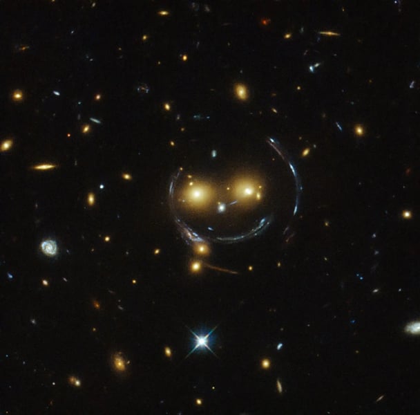 Gravitational lensing revealing a distant early universe galaxy magnified by a galaxy cluster