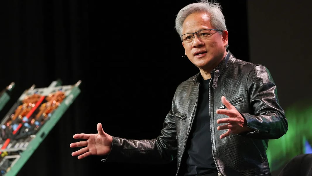 Nvidia CEO Jensen Huang speaks during an AI infrastructure presentation after Nvidia reported record 2026 earnings