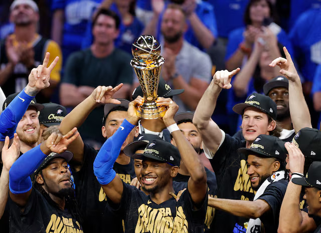 Shai Gilgeous-Alexander celebrating MVP award in Thunder arena