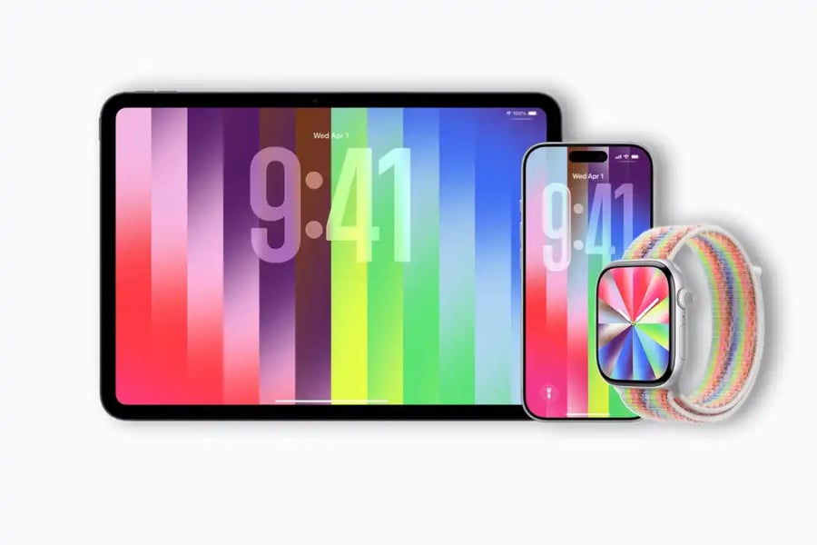 Apple Watch displaying Pride Luminance watch face with dynamic colors