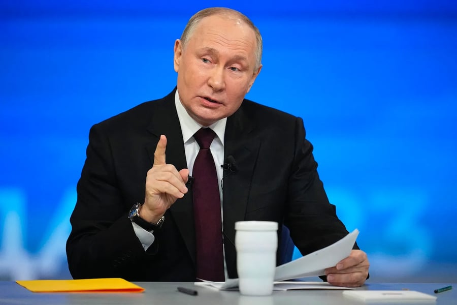 Russian President Vladimir Putin attends an economic meeting in Moscow as Russia reports GDP growth