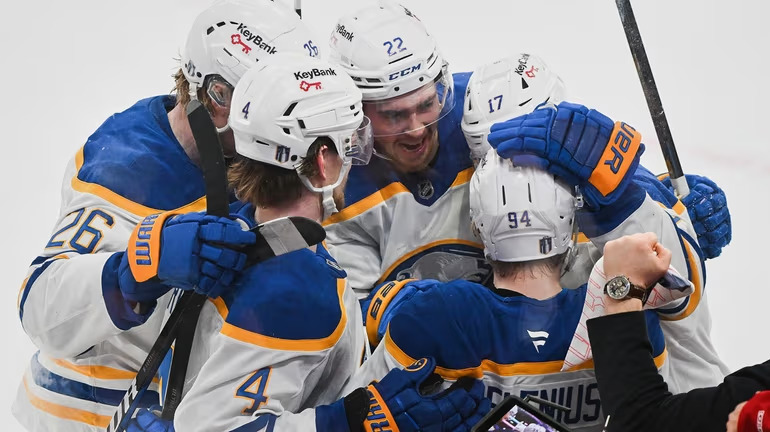 Rasmus Dahlin celebrates after leading Buffalo Sabres comeback win over Montreal Canadiens in NHL playoff Game 6