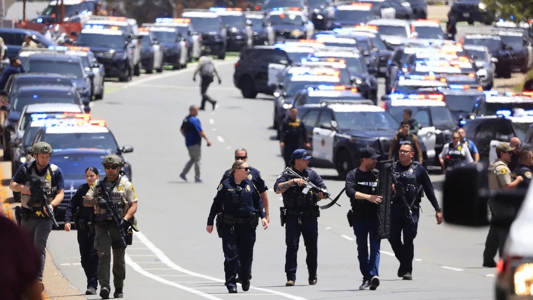 Police respond outside Islamic Center of San Diego after deadly mosque shooting