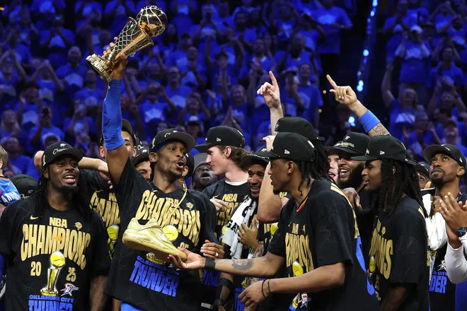 Shai Gilgeous-Alexander celebrating MVP award in Thunder arena