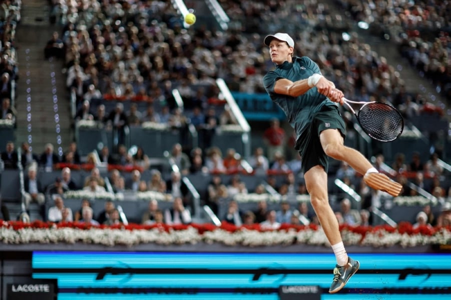 Sinner’s dominance at Madrid Open Jannik Sinner playing aggressive forehand during Madrid Open 2026