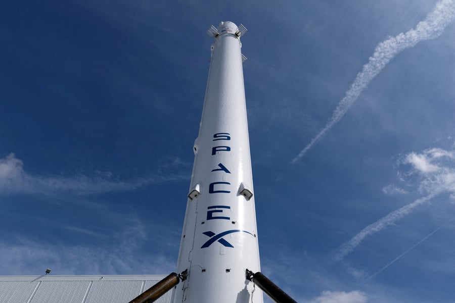 Elon Musk during SpaceX IPO push as Starlink satellites and AI infrastructure drive $2 trillion valuation speculation