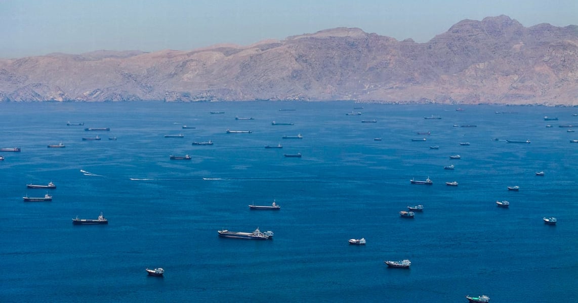 Oil tankers anchored near the Strait of Hormuz as US strikes on Iran disrupt global crude supply