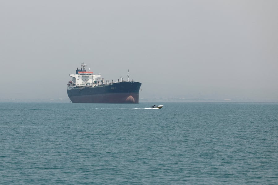 Vessels sail in the Strait of Hormuz off Iran as Trump describes US-Iran war negotiations as advancing