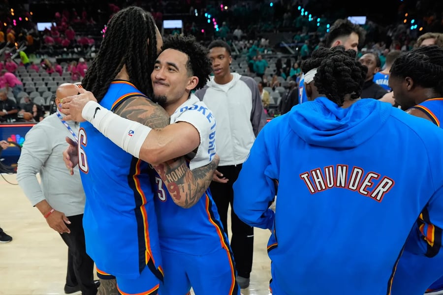 Shai Gilgeous-Alexander celebrates with Oklahoma City Thunder teammates during Game 3 against the San Antonio Spurs in the Western Conference Finals